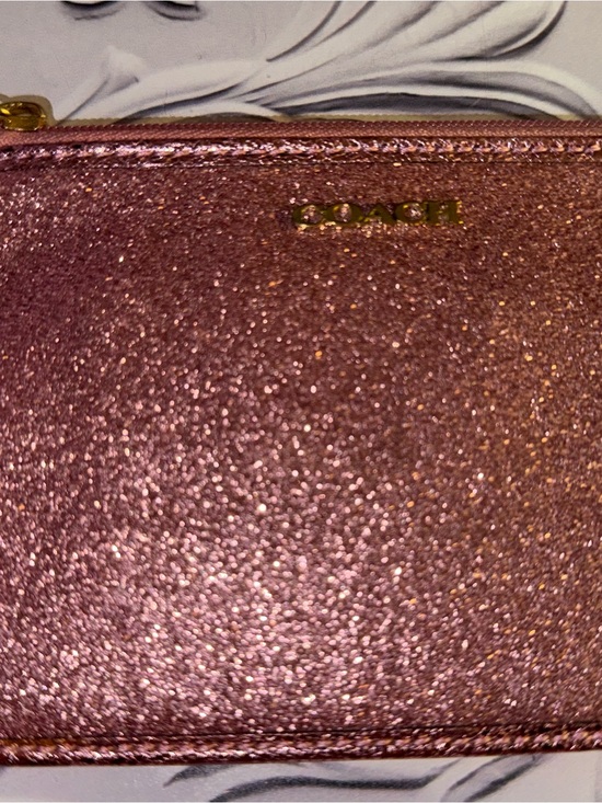 Coach Handbags - Coach glitter wristlet wallet in a rose gold